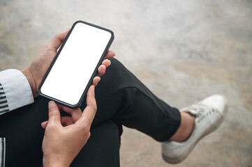 Wall Mural - woman hands holding blank screen smartphone.