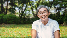 Portrait Of Healthy Happy Senior Asian Old Man In The Park Outdoors Exercise Stretching His Arms. Spring Healthcare Lifestyle Grandfather Retirement Wellness Healthy, Chinese Old Men Concept