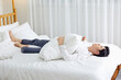 © 이 상신 - An office worker in his 30s who is sleeping on a weekend bed.