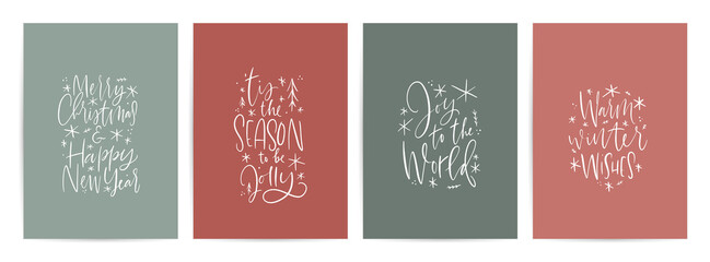 Wall Mural - Christmas calligraphy greeting card set. Traditional winter holiday wishes. Modern script signs with snowflakes on red and green backgrounds.