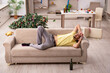 © Elnur - Young man cleaning the apartment after Christmas party