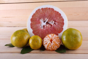 Canvas Print - Pomelo and mandarin oranges on table