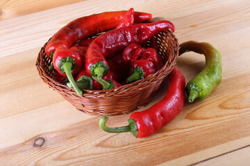 Canvas Print - Red peppers on table