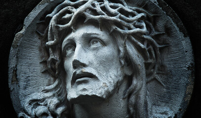 Fototapete - Fragment of an ancient statue of Jesus Christ