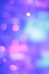 Wall Mural - illuminated pink, blue and purple party lights bokeh background