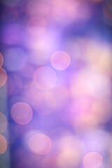 Wall Mural - illuminated pink, blue and purple party lights bokeh background