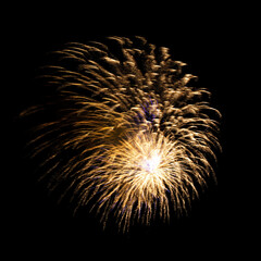 Colorful celebration fireworks isolated on black sky background.