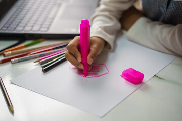 Pretty stylish schoolgirl studying homework art during her online lesson at home, social distance during quarantine, self-isolation, online education concept, home schooler