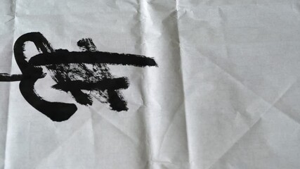 Wall Mural - an old calligrapher is writing calligraphy and writing calligraphy