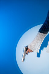 Wall Mural - Lady holding pistol gun