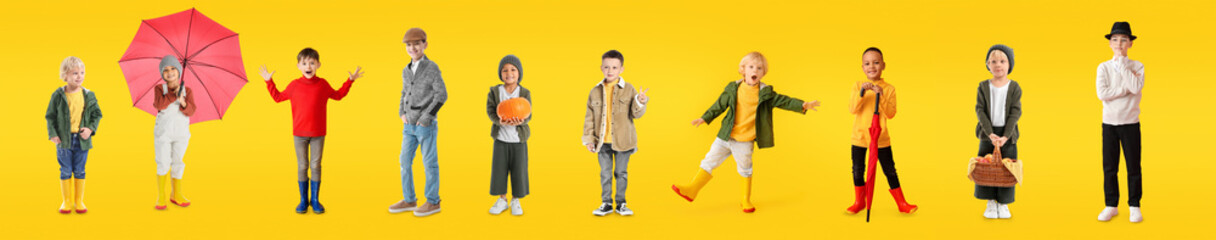 Canvas Print - Group of stylish little boys in autumn clothes on yellow background