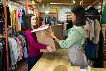 Beautiful woman selling vintage clothes