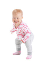 Sticker - Cute baby girl learning to walk on white background