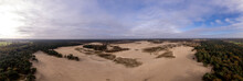 Wide Aerial Panorama Of Loonse En Drunense Duinen Sand Dunes In The Netherlands. Unique Dutch Natural Phenomenon Of Sandbank Drift Plain Seen From Above. 