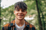 portrait of teenage boy outdoors