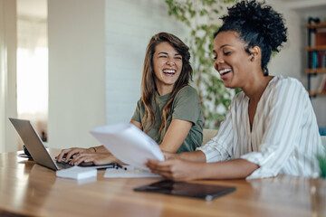 Smiling coworkers, enjoying their work