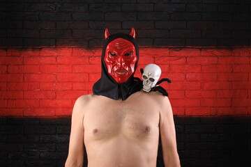 Sticker - portrait of a naked man in a mask of the devil