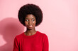 Photo of disgusted unhappy afro american young woman look empty space dislike isolated on pink color background