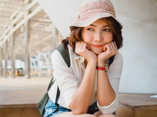 Attractive Young Smiling Asian Woman Outdoors Portrait In The City Real People Series. Outdoors Lifestyle Fashion Portrait Of Happy Smiling Asian Girl. Summer Outdoor Happiness Portrait Concept.