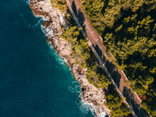  The Waves Of The Adriatic Wash Over The Rocky Shore. High Quality Photo. A Photo From A Drone Of The Rocky Coast Of The Adriatic Sea. Bright Colors Of The Sea In Cloudy Weather. Croatia, Pula