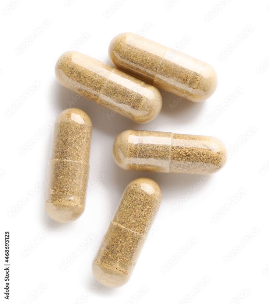 Vitamin K capsules isolated on white background