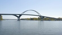 Establishing Above Water Dolly Shot Of Lake Champlain Bridge In New York.