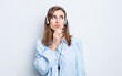 © kues1 - young pretty woman thinking, feeling doubtful and confused. telemarketer concept