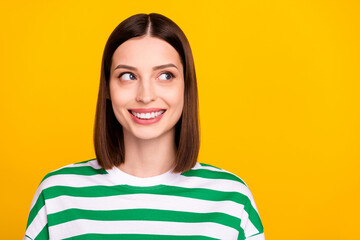 Wall Mural - Photo of optimistic brunette young lady look promo wear green t-shirt isolated on yellow color background