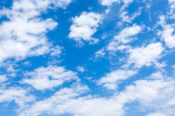 Wall Mural - fast moving clouds in the blue sky