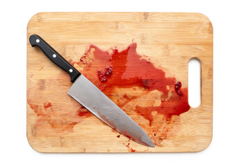 Fototapeta cutting board with bloody surface and knife isolated on white. top view