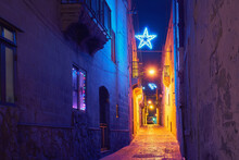 Authentic Tiny Street Of Old City Malta In The Christmas Decor And Illuminations, Christmas Star And Lights
