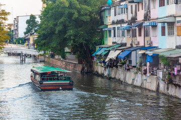 Wall Mural - BANGKOK, THAILAND, 12 JANUARY 2020: Boat in the canal of Bangkok