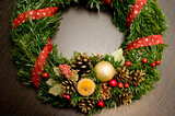 Fototapeta Do akwarium - Festive background with an Advent wreath. Christmas mood. Handmade decoration.
