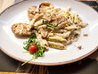 Delicious creamy seafood penne pasta with slices of fragrant truffle mushrooms. 