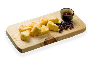 Wall Mural - Fried Camembert with black currant on the board isolated on white background
