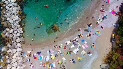 Wall Mural - Overhead aerial view of beautiful mediterranean beach and coastline in summer season. Travel concept
