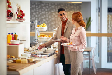 business men having lunch at office cafeteria with woman  colleagues