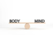 © photobuay - Balancing body and mind wellness concept minimalist setting health focused inspirational viewpoint for mindfulness white background.