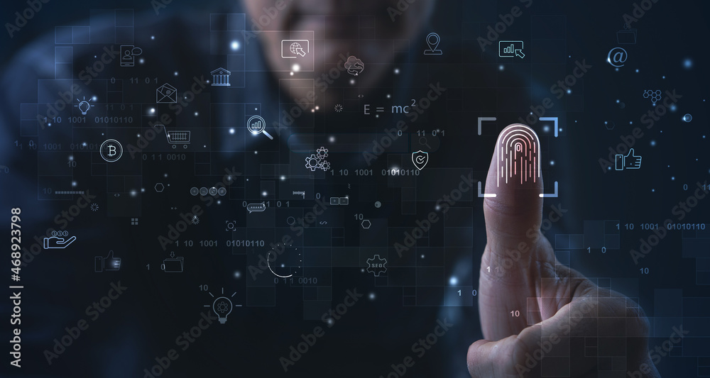 Businessman using fingerprint identification to access personal ...