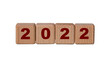 © Zhanna - 2022 - red numbers on wooden cubes isolated on a white background.