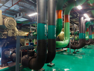 The Water pump system of chiller room in building.