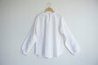 White blouse linen on white background.