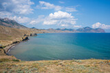 Fototapeta Tulipany - View of the Black Sea and the Kara Dag volcano in Crimea