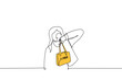 woman stands demonstrating luxury bag - one line drawing vector. concept of fashion blogger fashion influencer or stylist promoting expensive premium segment