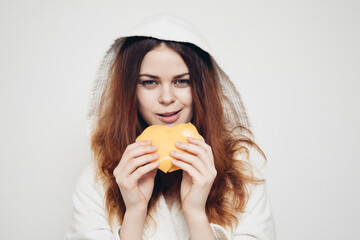 Wall Mural - cheerful woman eating sandwich snack fast food