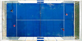 Fototapeta Sypialnia - View from above, stunning aerial view of some people playing on a blue padel court. Padel is a mix between Tennis and Squash. It's usually played in doubles on an enclosed court.
