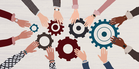 Canvas Print - Group arms and hands of multicultural business people connecting and joining pieces of gears on a table. Concept of teamwork brainstorming or meeting between colleagues and co-worker