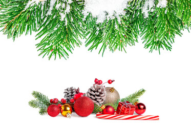 Wall Mural - christmas background with fir branches and decorations isolated on white background.