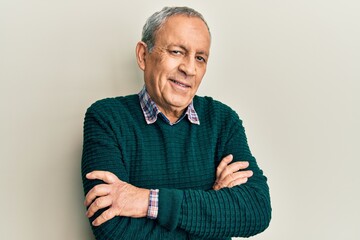 Poster - Handsome senior man with grey hair wearing casual sweater happy face smiling with crossed arms looking at the camera. positive person.