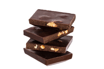 Poster - four pieces of dark chocolate with nuts stacked in a vertical row isolated on white background